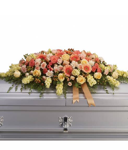 Flowers for casket in this casket spray flower arrangement with cheap flowers