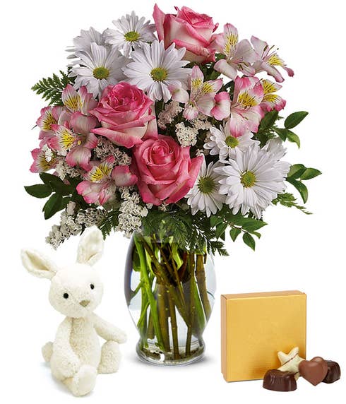 Easter flowers bouquet with stuffed Easter bunny plush animal and chocolates
