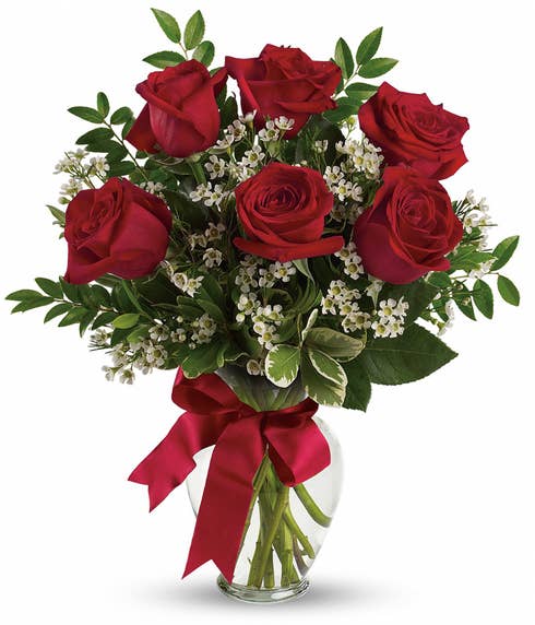 6 dark red roses with babies breath delivered inside a glass flower vase