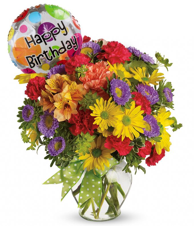 A Bouquet of Yellow Daisy Spray Mums, Orange Carnations, Purple Matsumoto Asters and Orange Alstroemeria in a Glass Vase with Happy Birthday Mylar Balloon