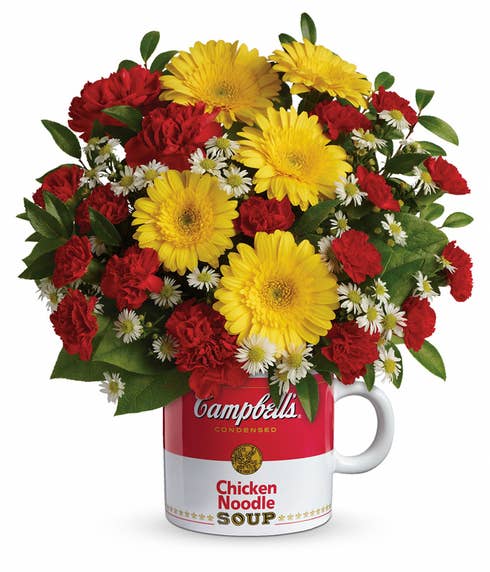 Flowers in a mug with cheap flowers yellow daisies and yellow gerbera daisies