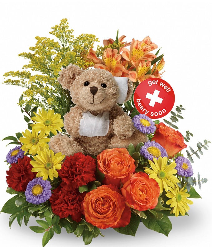 A Bouquet of Orange Roses, Orange Alstroemeria, Red Carnations, Lavender Aster Matsumotos, Yellow Daisy Spray Chrysanthemums, Yellow Solidago, Variegated Pittosporum, Spiral Eucalyptus, Huckleberry and Lemon Leaf with Teddy Toy