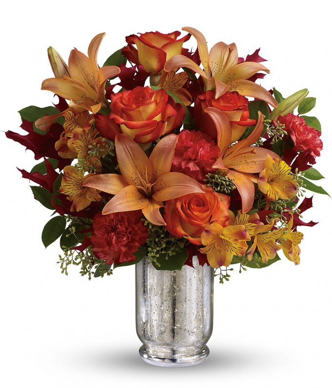 Orange carnations from sendflowers with orange lilies and free flowers delivery