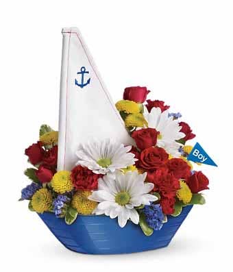 A Bouquet of White Daisy Spray Mums, Red Mini Carnations, Yellow Button Spray Mums, and Lush Greens in a Sailboat Container