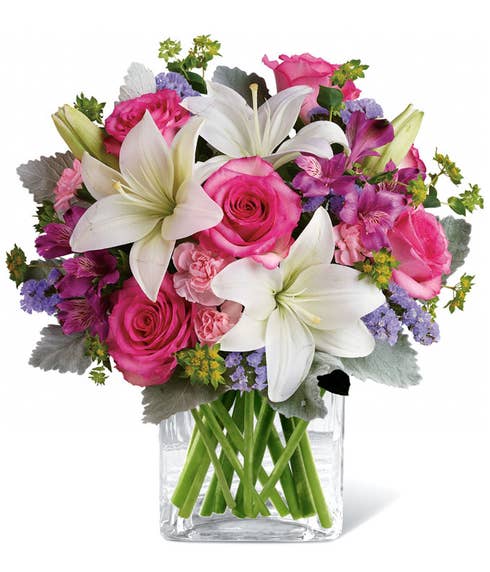 Hot pink rose and white lily bouquet with purple alstroemeria and lavender statice